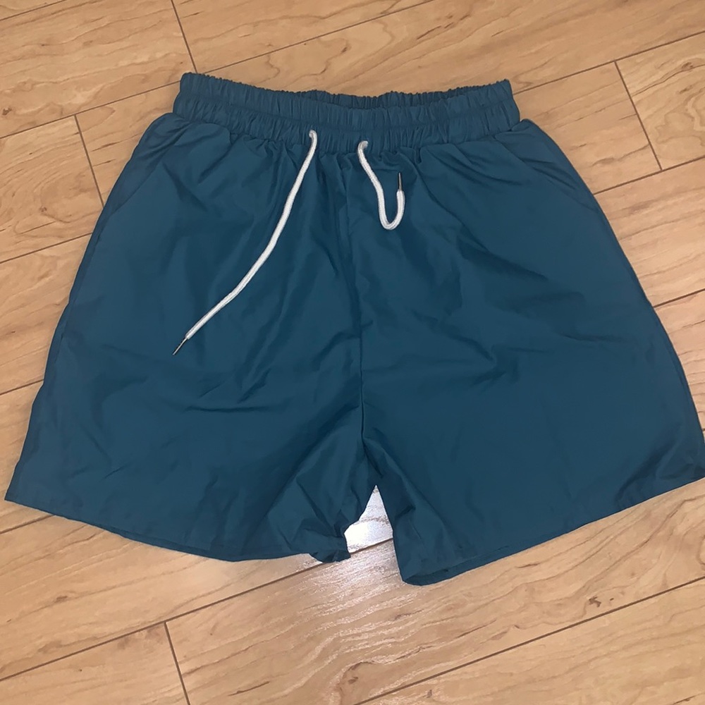 Green woven shorts